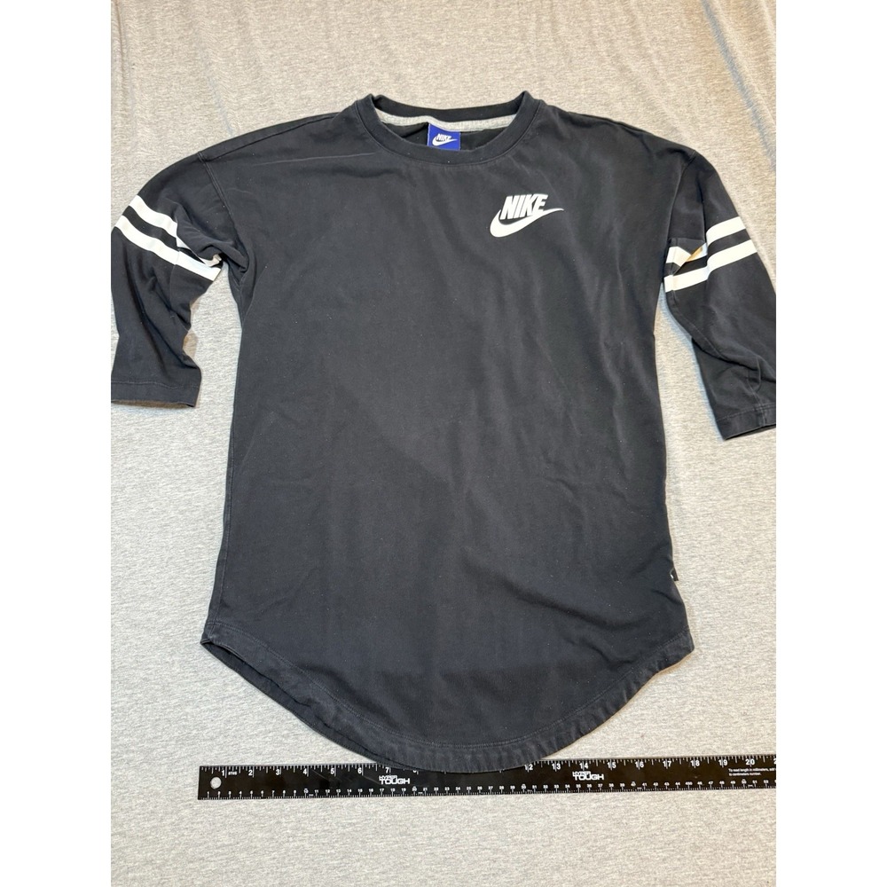 Nike black long-sleeve w/ white stripes on the sleeves and a curved hem - Small